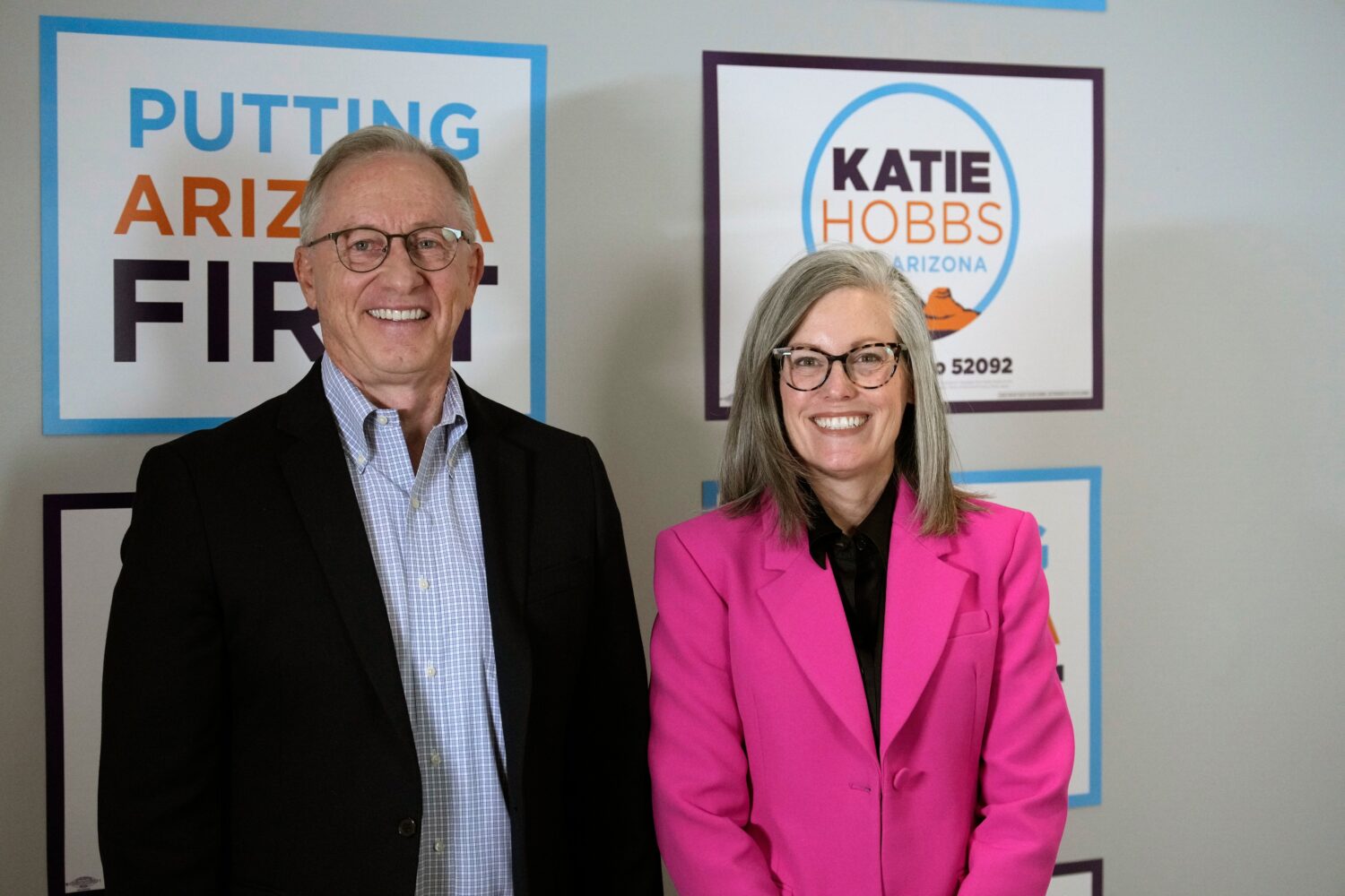 Arizona Democratic Gov. Katie Hobbs, right, poses for a photograph with her running mate for Lieute...