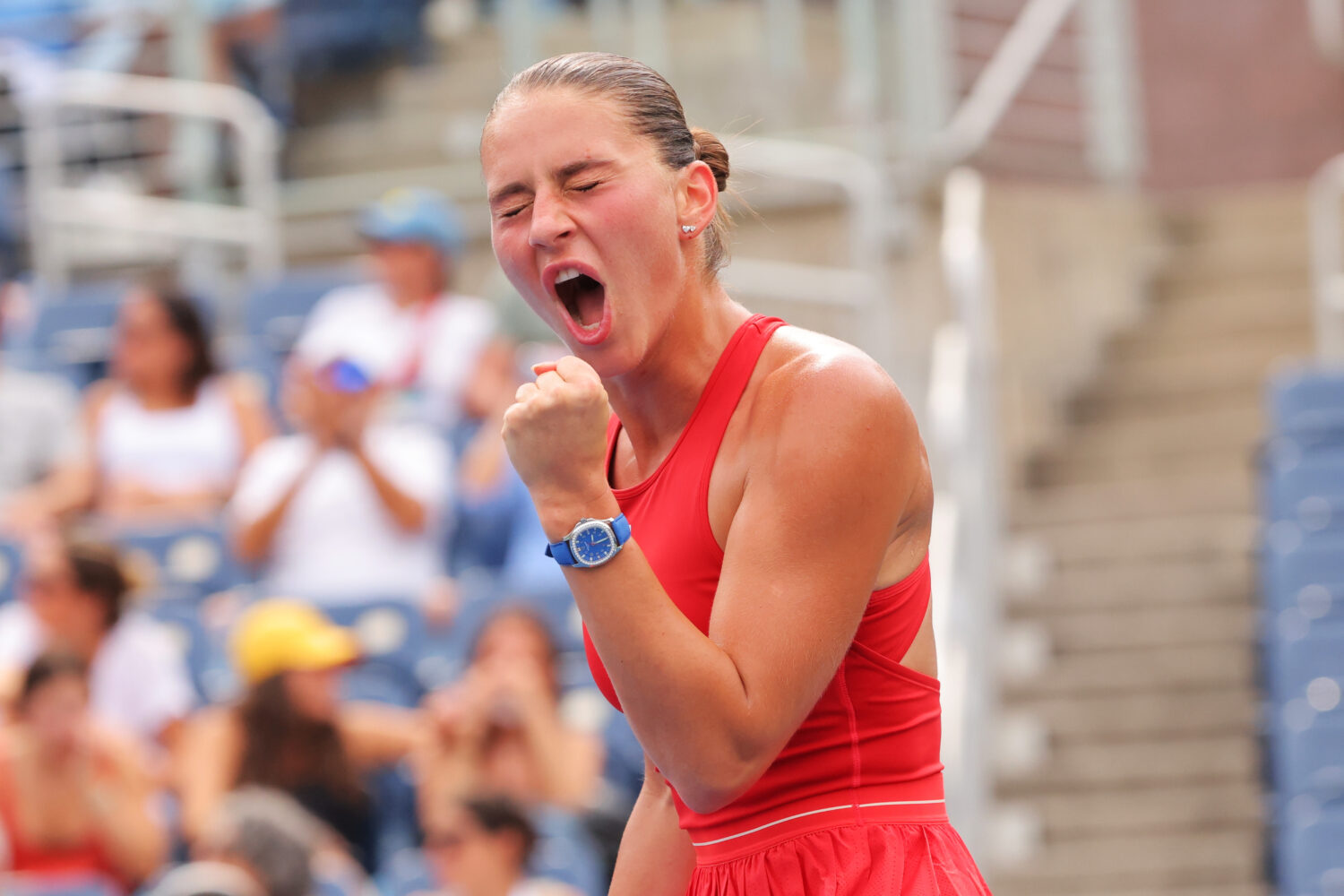 Marta Kostyuk, of Ukraine, reacts following a match against Storm Hunter, of Australia, during the ...