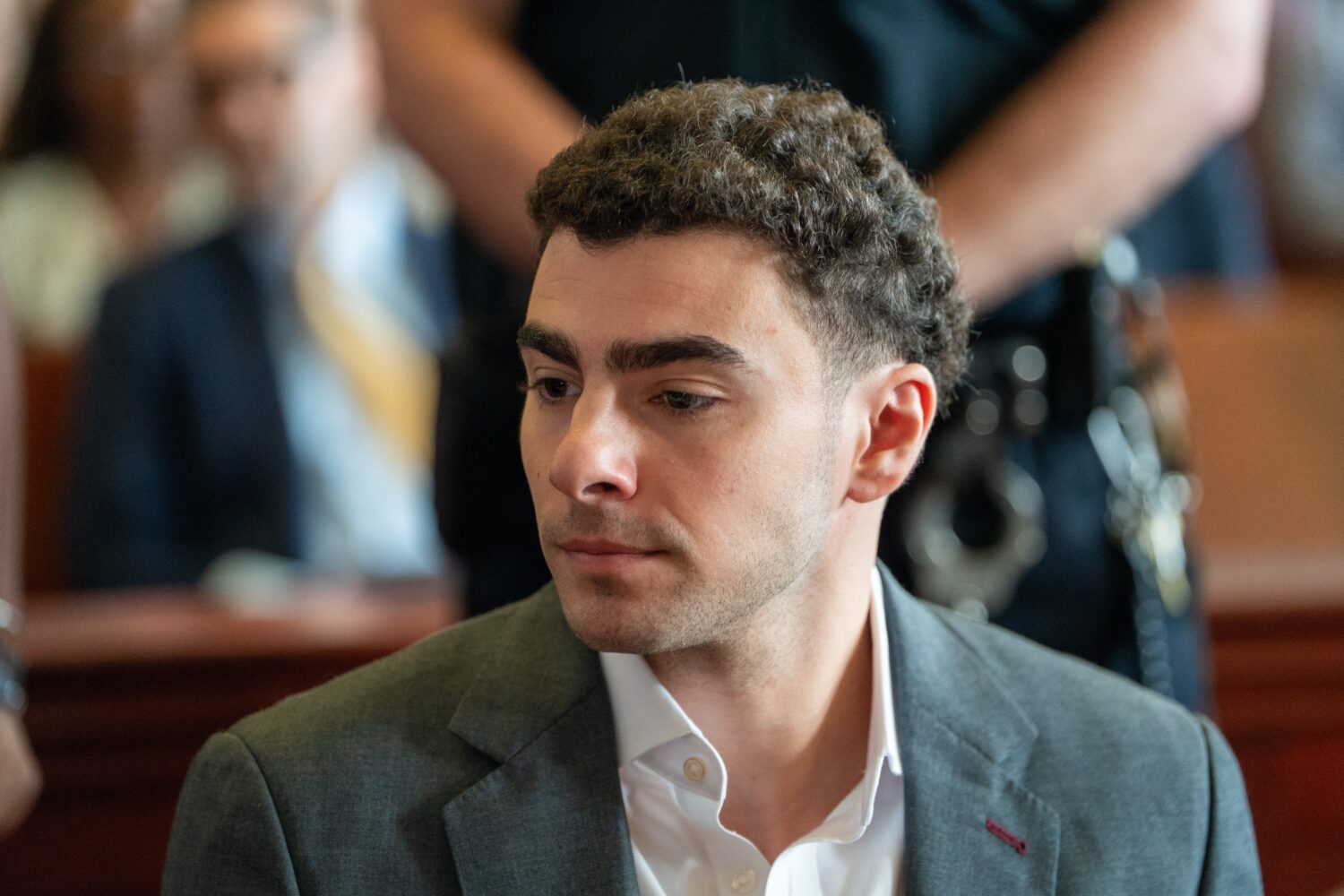 Luigi Mangione appears for a pre-trial hearing at Manhattan Criminal Court in New York, on Tuesday,...