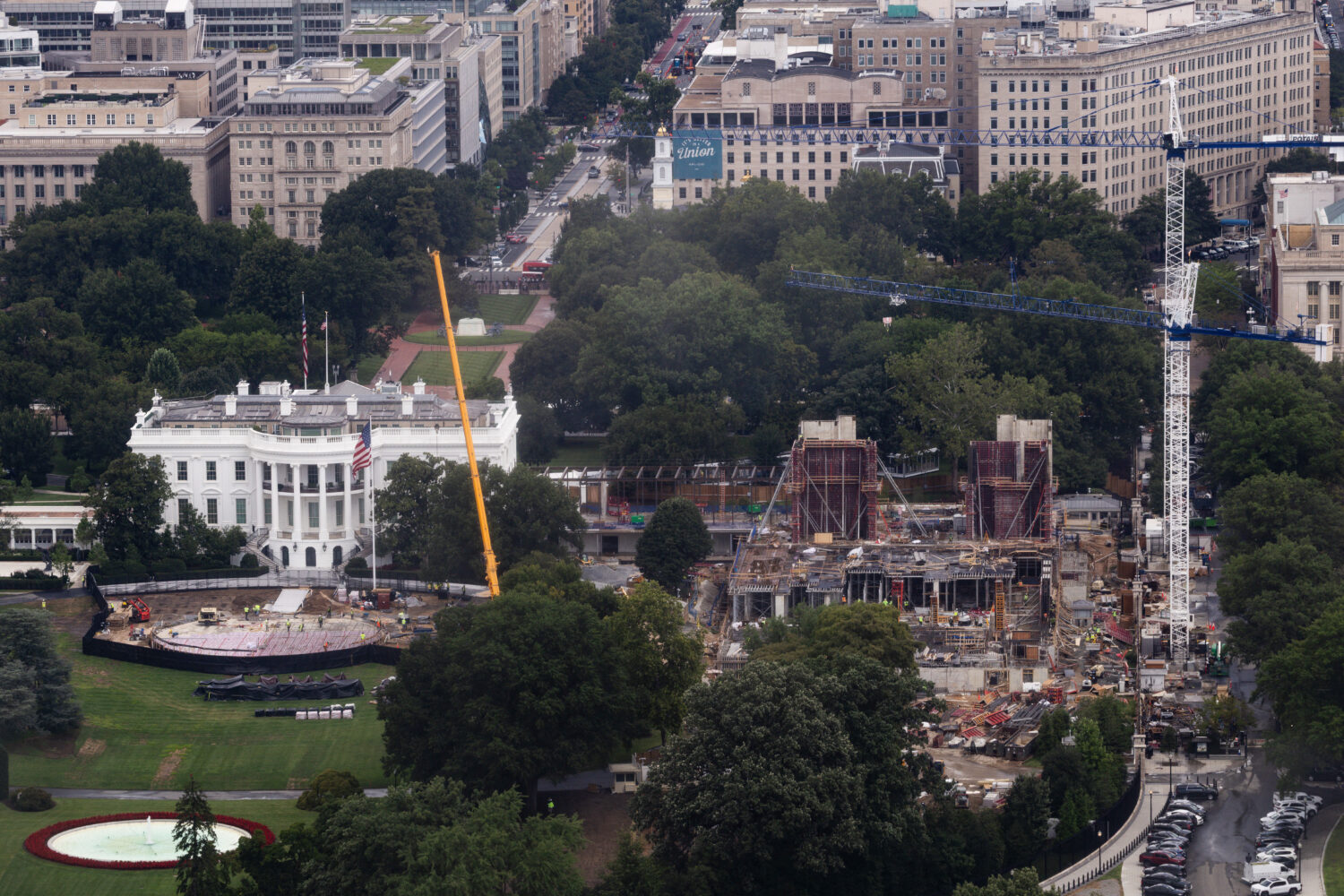 Construction continues on a helipad and the White House Ballroom on the South Lawn of the White Hou...