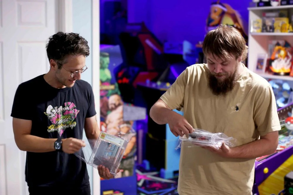 In this photo provided by Nintendo Wire, publisher Jason Ganos, left, and OneStopWonders store owne...