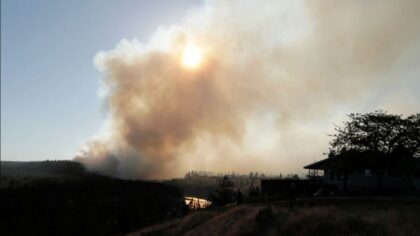 The Old Trail Fire, seen from Spokane's W. Northwest Blvd. (AP Photo/Young Kwak)...