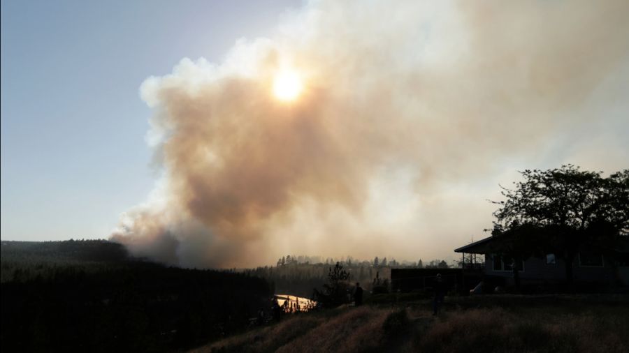 The Old Trail Fire, seen from Spokane's W. Northwest Blvd. (AP Photo/Young Kwak)...