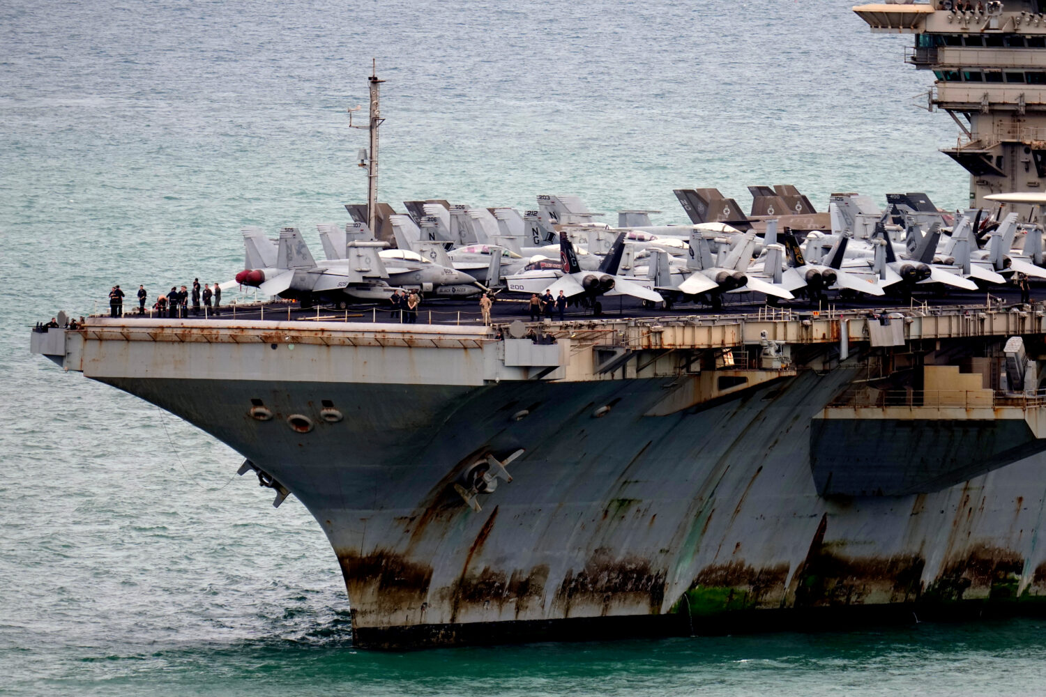 The U.S. Navy aircraft carrier USS Abraham Lincoln arrives at the port in Laem Chabang, Chonburi, T...