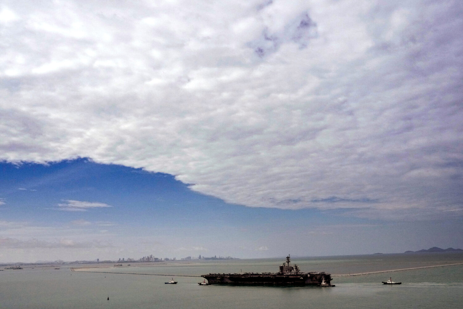The U.S. Navy aircraft carrier USS Abraham Lincoln arrives at the port in Laem Chabang, Chonburi, T...