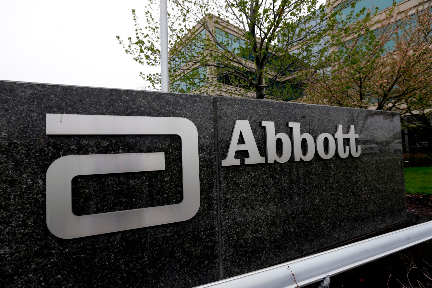 FILE - A sign at an Abbott Laboratories campus facility is displayed, April 28, 2016, in Lake Fores...