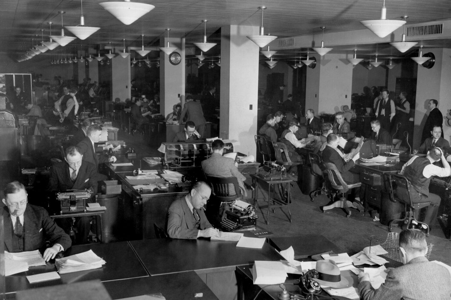 The newsroom of the Associated Press headquarters at 50 Rockefeller Plaza, 1939. (AP Photo/Corporat...