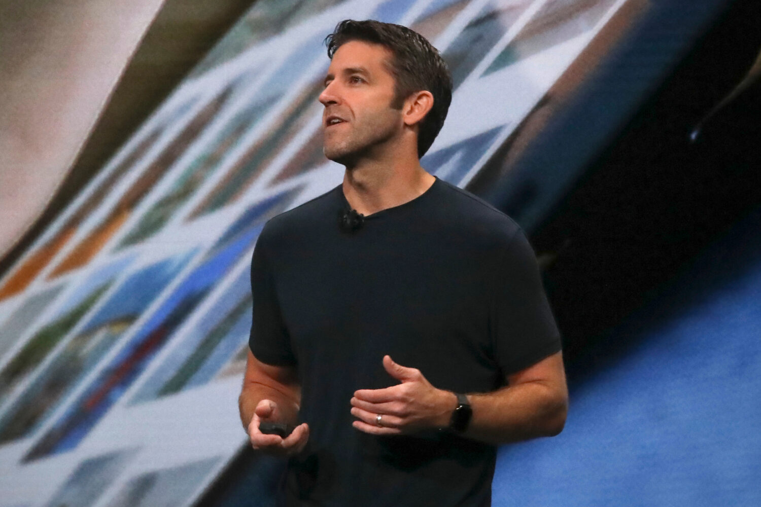 FILE - John Ternus, Apple's V.P. of Hardware Engineering, discusses the latest development for the ...