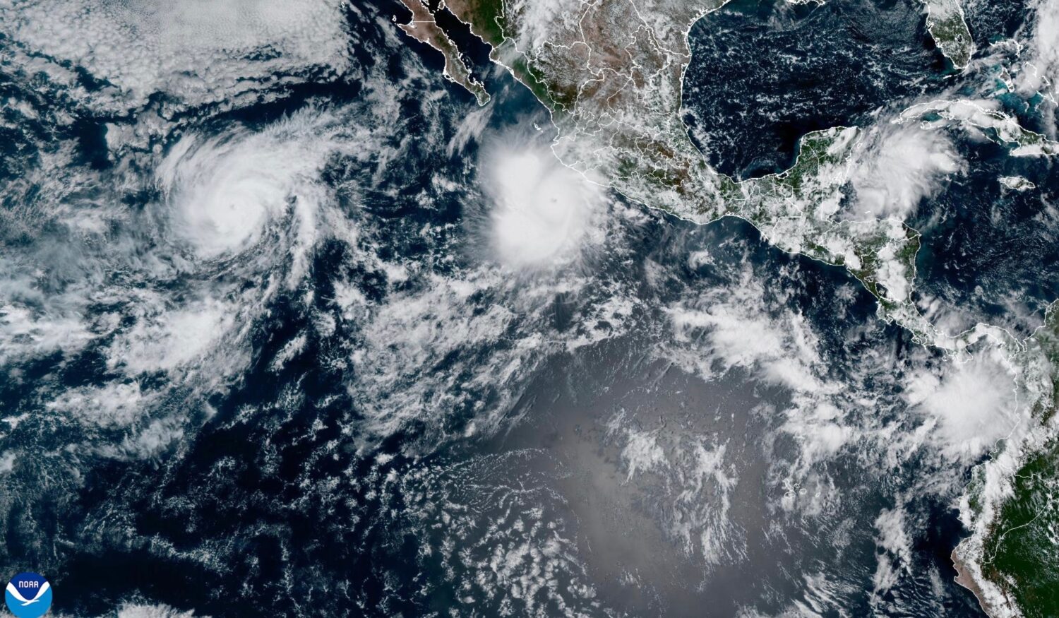 This satellite image provided by NOAA shows Hurricane Polo off the southwestern coast of Mexico and...