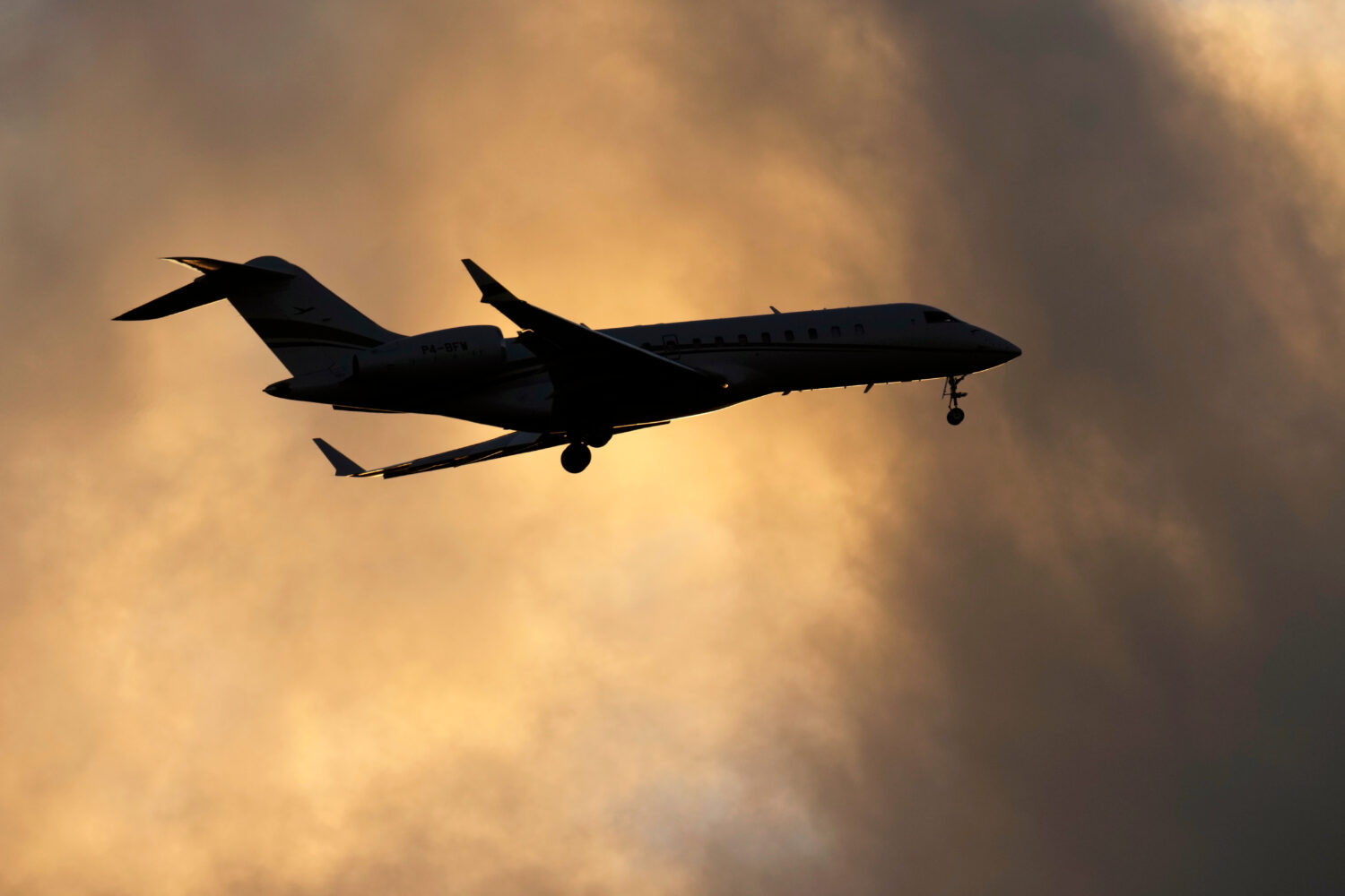 FILE - A Bombardier Global Express business jet approaches for landing in Lisbon, on June 13, 2023....