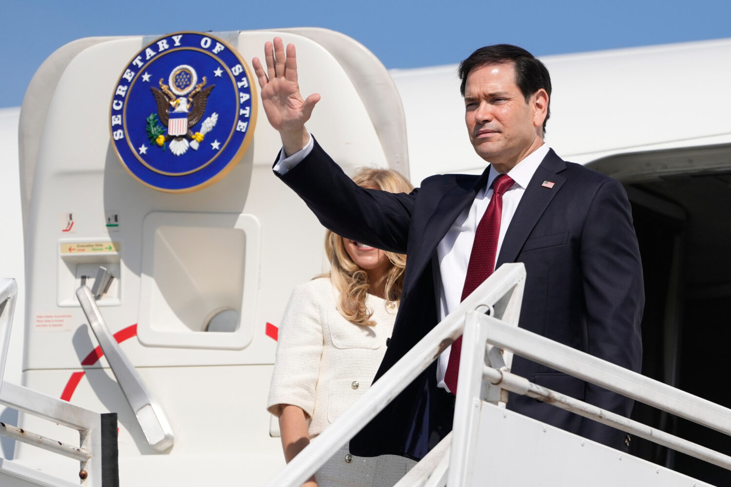 U.S. Secretary of State Marco Rubio and his wife Jeanette Rubio depart the international airport Er...