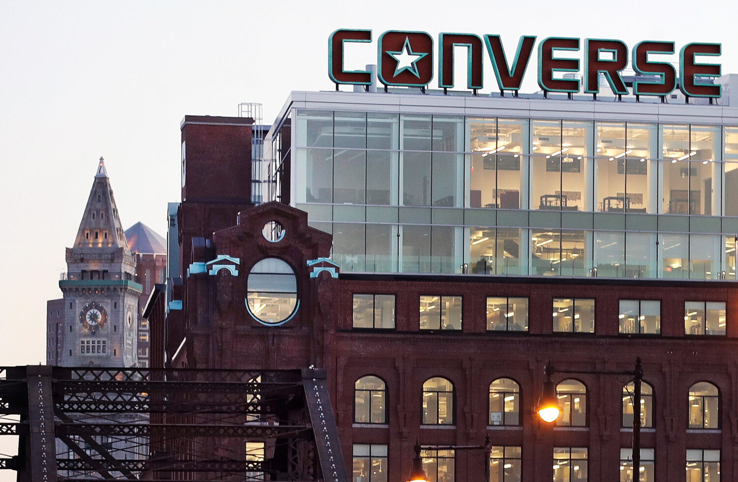 FILE - The Converse logo is displayed on the roof of the company's world headquarters in the West E...