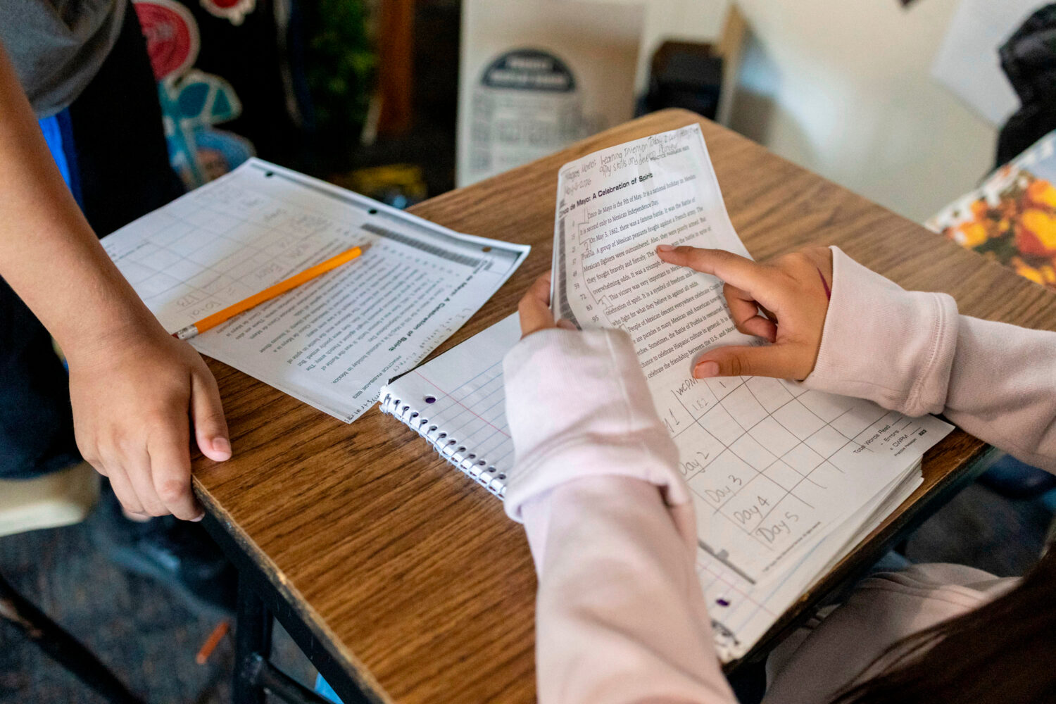 FILE - Sixth graders read a passage and give constructive feedback to their partners during Nancy B...