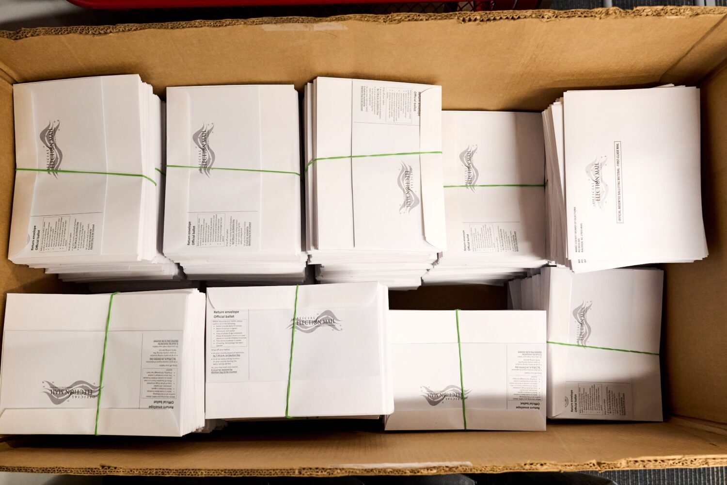 A large box of pre-assembled mail-in ballots at the Wake County Board of Elections on Thursday, Sep...