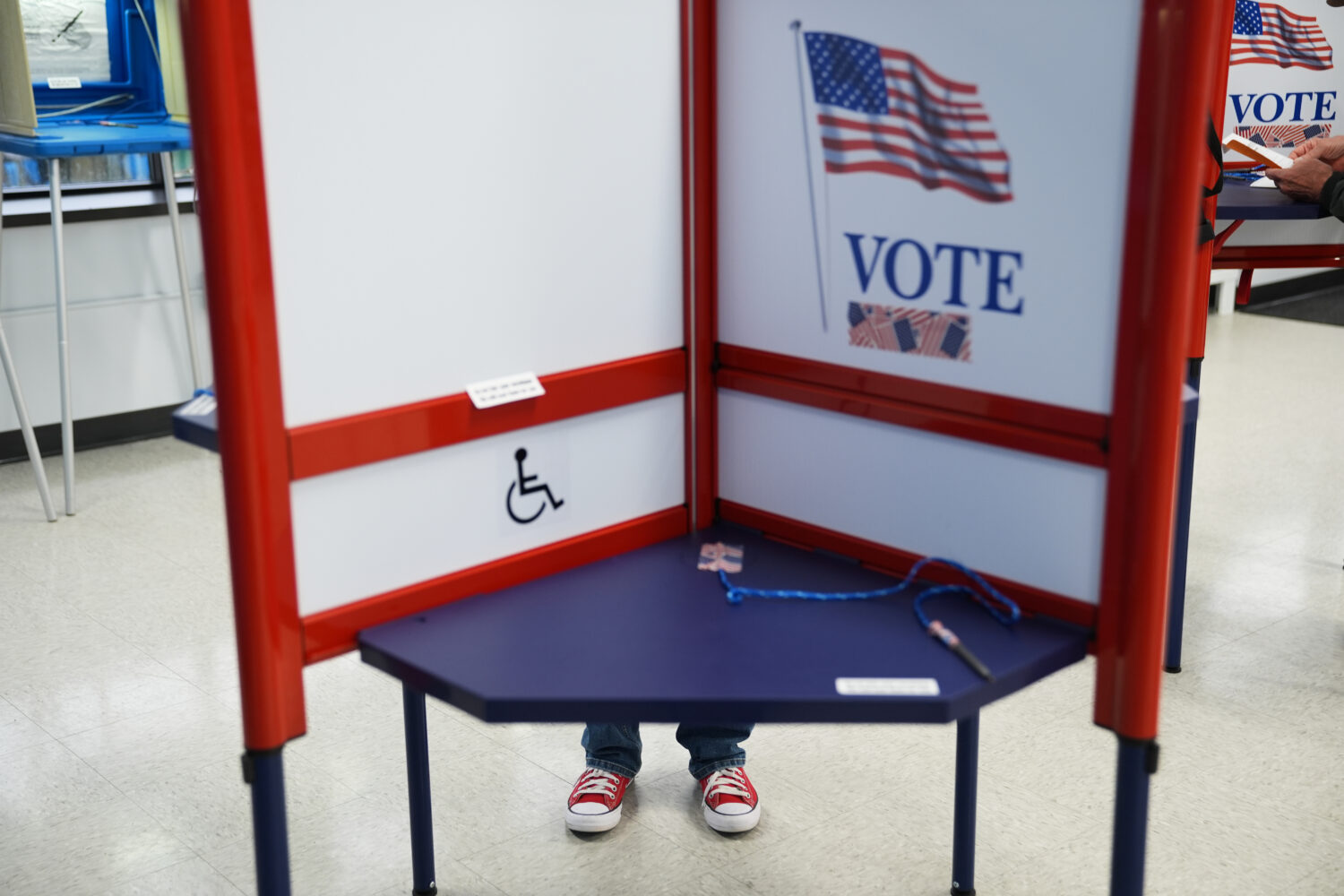 Voters cast their ballots on the first day of early voting in Minnesota at the Elections & Voter Se...