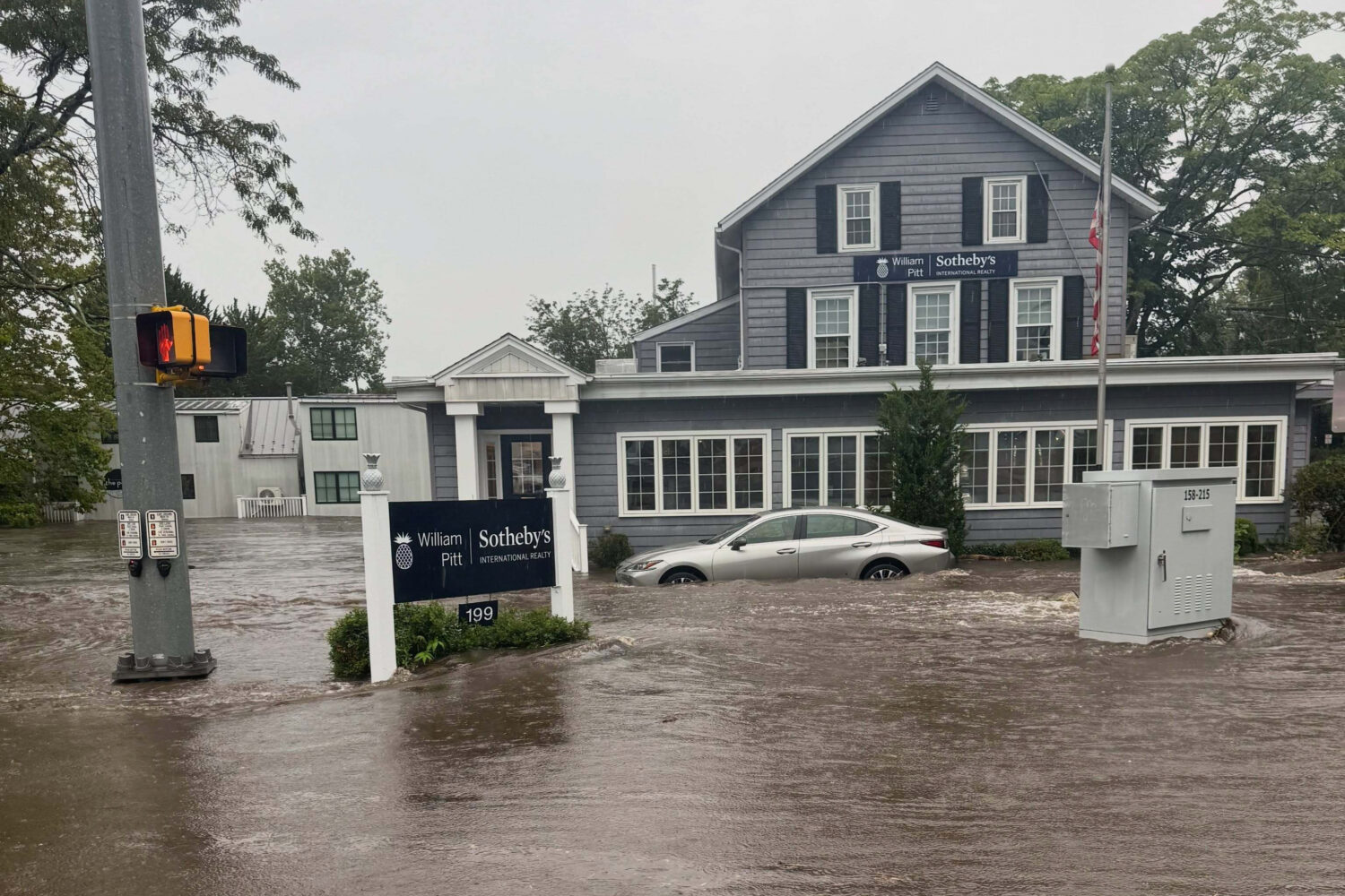 This photo provided by Westport Fire Department shows flash flooding in Westport, Conn., Sunday, Se...