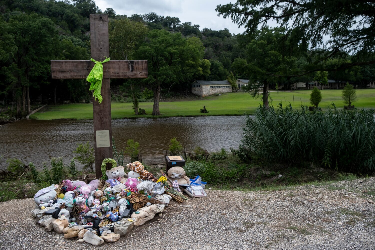 FILE - A memorial for the victims of the 2025 Camp Mystic flood stands, July 17, 2026, in Hunt, Tex...