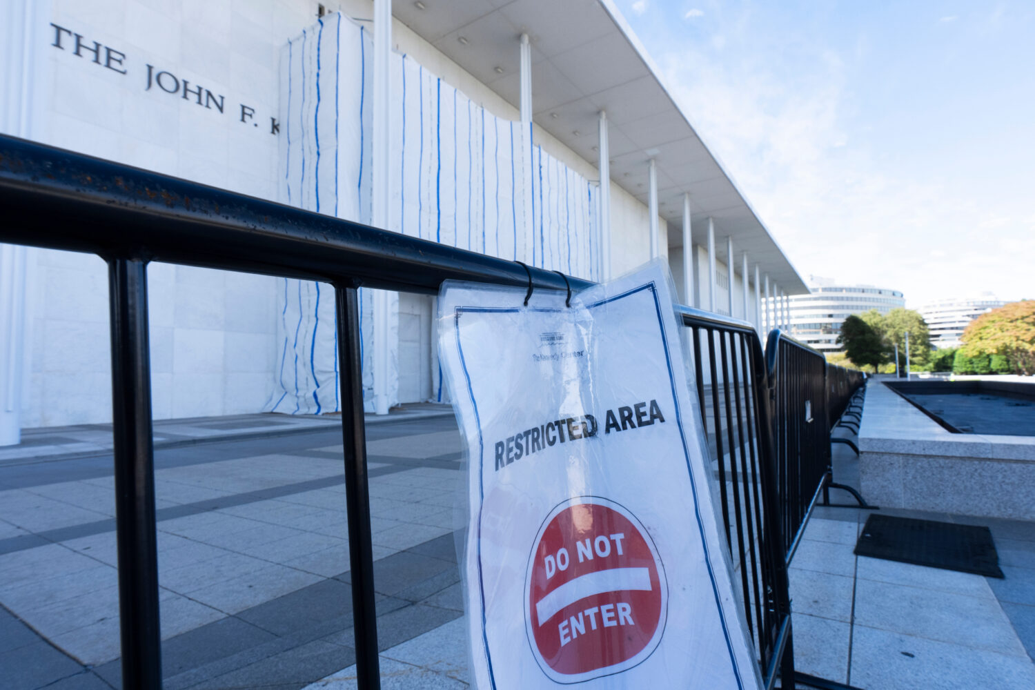 A "Do Not Enter" sign is pictured on the fence at the John F. Kennedy Center for the Performing Art...
