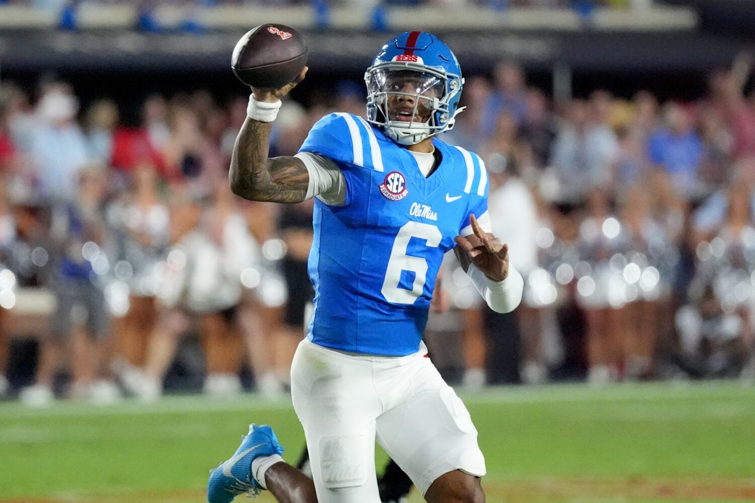 Mississippi quarterback Trinidad Chambliss (6) attempts to pass against LSU during the first half o...