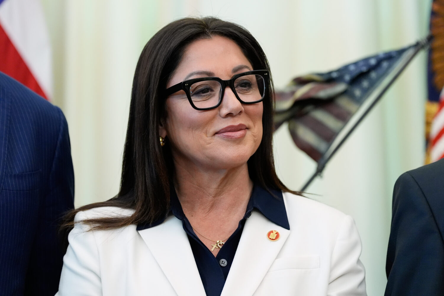 FILE - Labor Secretary Lori Chavez-DeRemer listens as President Donald Trump speaks in the Oval Off...