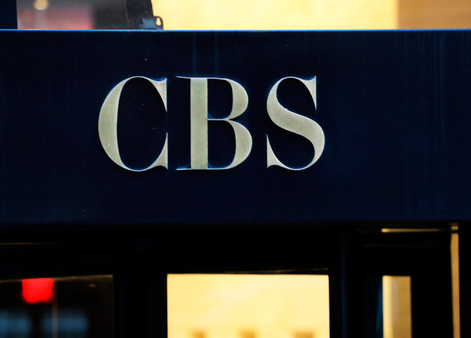 FILE - The CBS logo is displayed at the entrance to its headquarters, in New York, on Dec. 6, 2018....