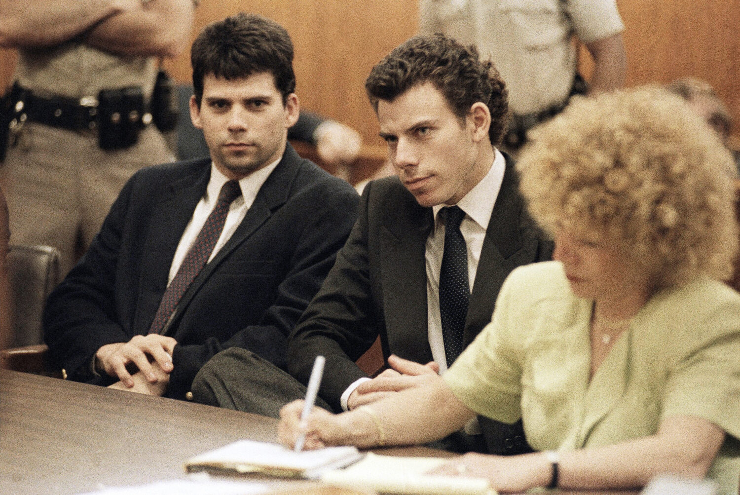 FILE - Lyle, left, and Erik Galen Menendez sit in a courtroom in Beverly Hills, Calif., May 14, 199...