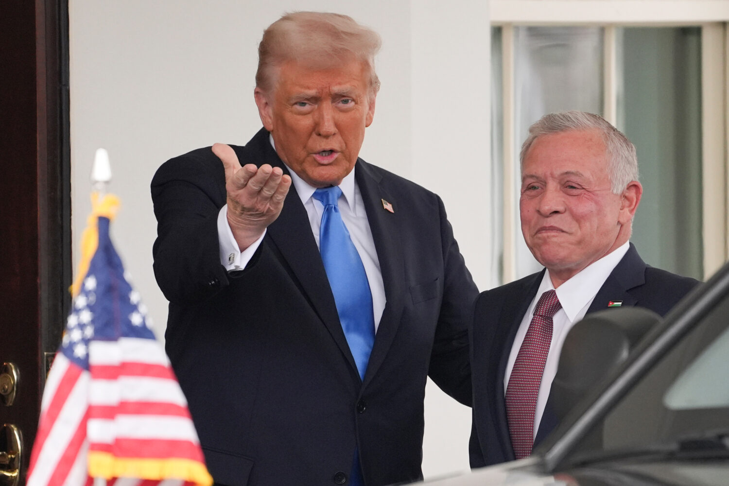 FILE - President Donald Trump greets Jordan's King Abdullah II at the White House, Tuesday, Feb. 11...