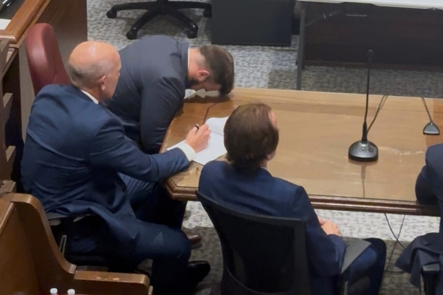 Former Capitol Police officer Steven Frederick Jr., top, reacts on Monday, Sept. 28, 2026, at the H...