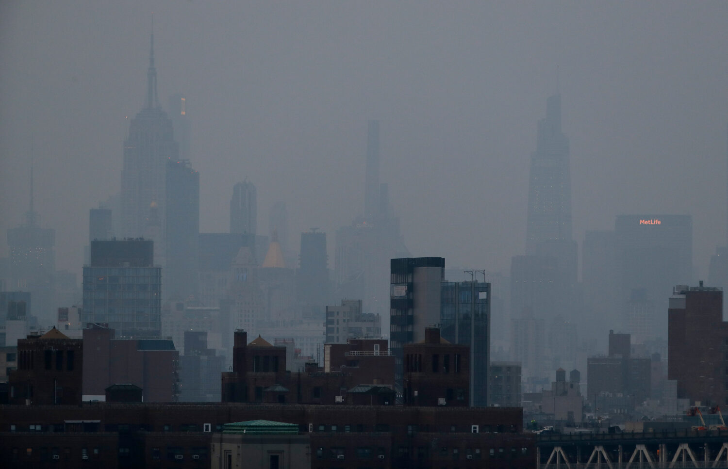 FILE - A thick haze hangs over Manhattan in New York on July 20, 2021. (AP Photo/Julie Jacobson, Fi...