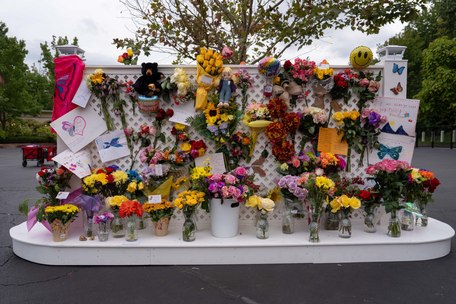 A memorial wall for Dolly Parton stands outside the Dollywood theme park in Pigeon Forge, Tenn., We...