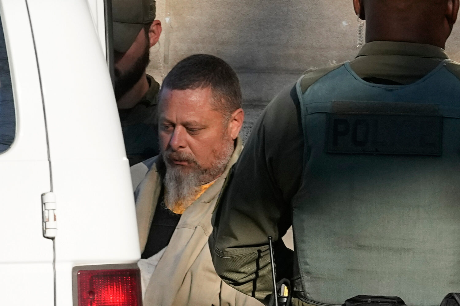 FILE - Officers escort Richard Allen out of the Carroll County courthouse following a hearing, Nov....
