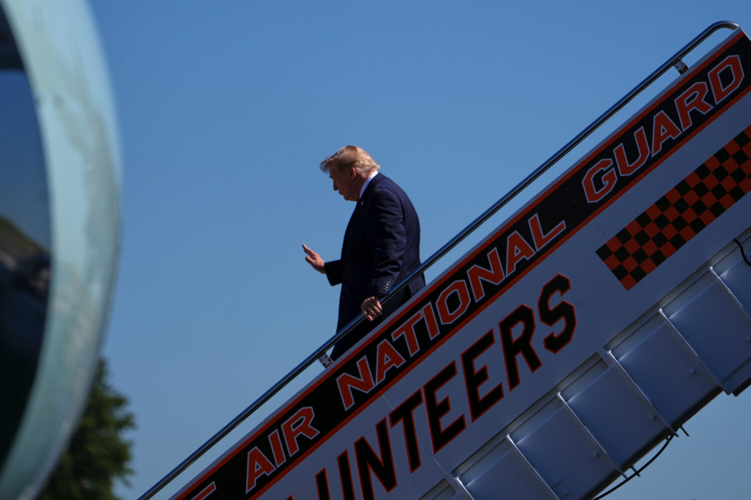 President Donald Trump disembarks Air Force one at McGhee Tyson Airport, Saturday, Sept. 26, 2026, ...