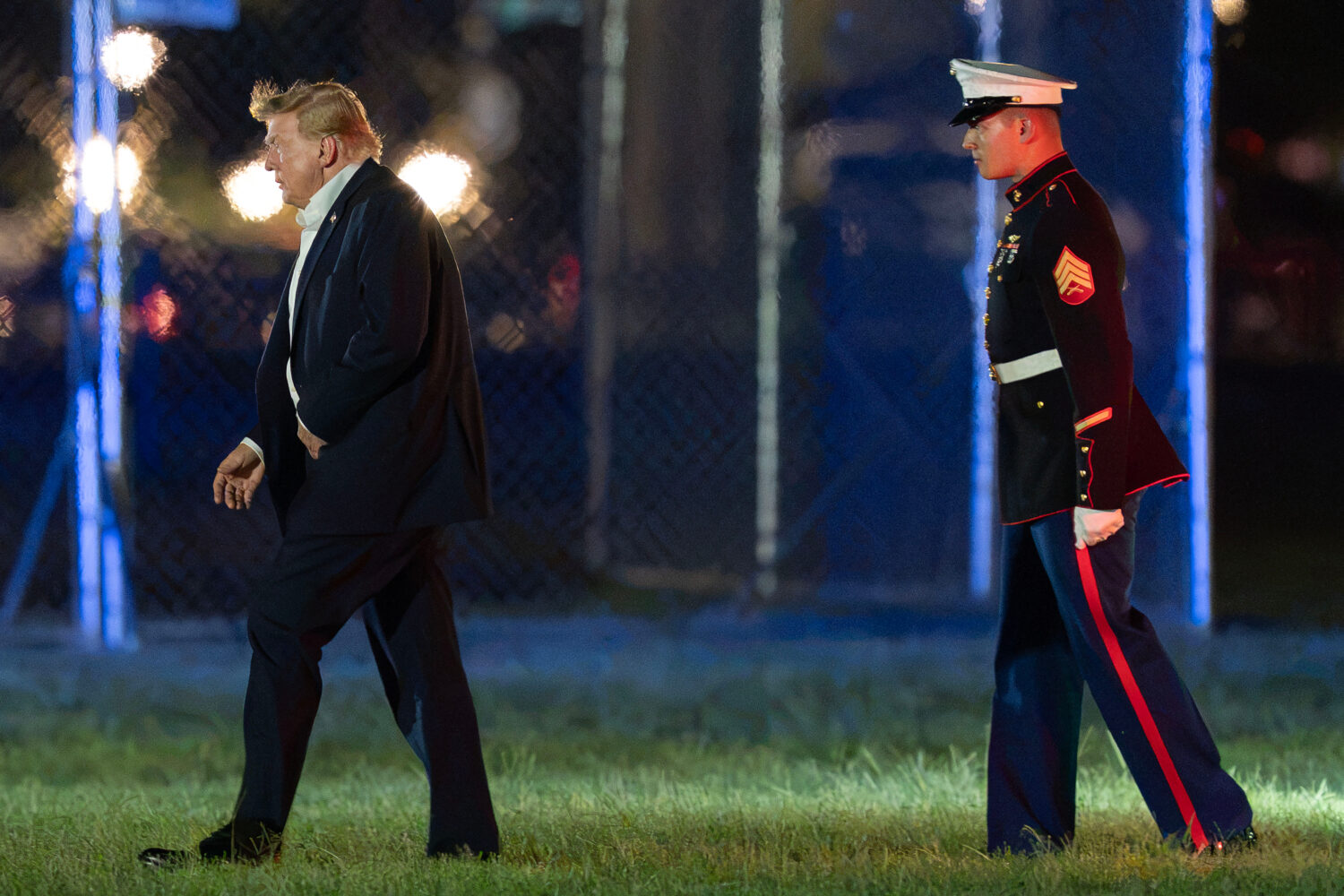 President Donald Trump walks from Marine One to his limousine upon his arrival at the Ellipse just ...
