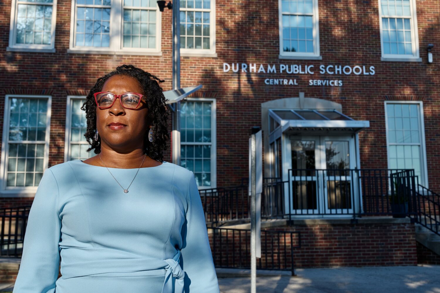 Jovonia Lewis poses for a portrait outside of the Durham Board of Education building on Monday, Sep...