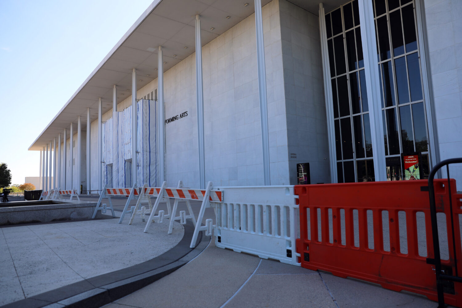Barricades are installed in front of the John F. Kennedy Center for the Performing Arts, Wednesday,...