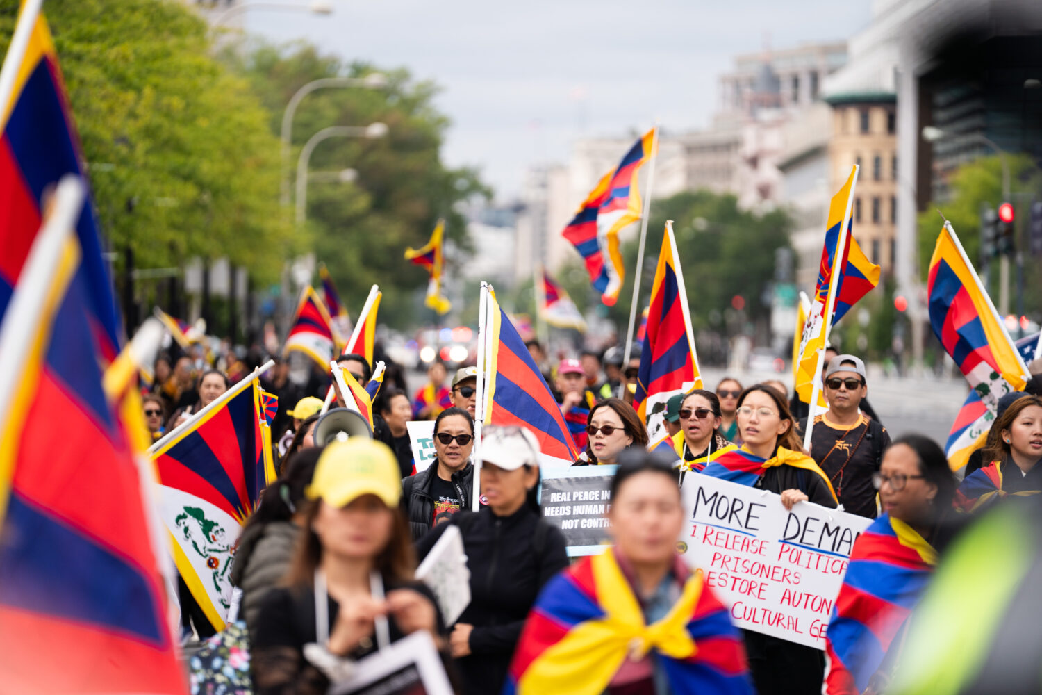 Pro-Tibet independence protestors demonstrate near the U.S. Capitol while China's President Xi Jinp...