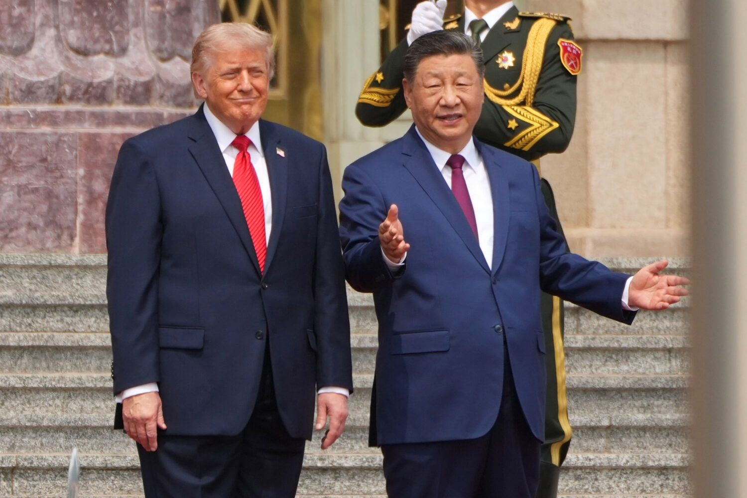 FILE - President Donald Trump, left, participates in a welcome ceremony with China's President Xi J...