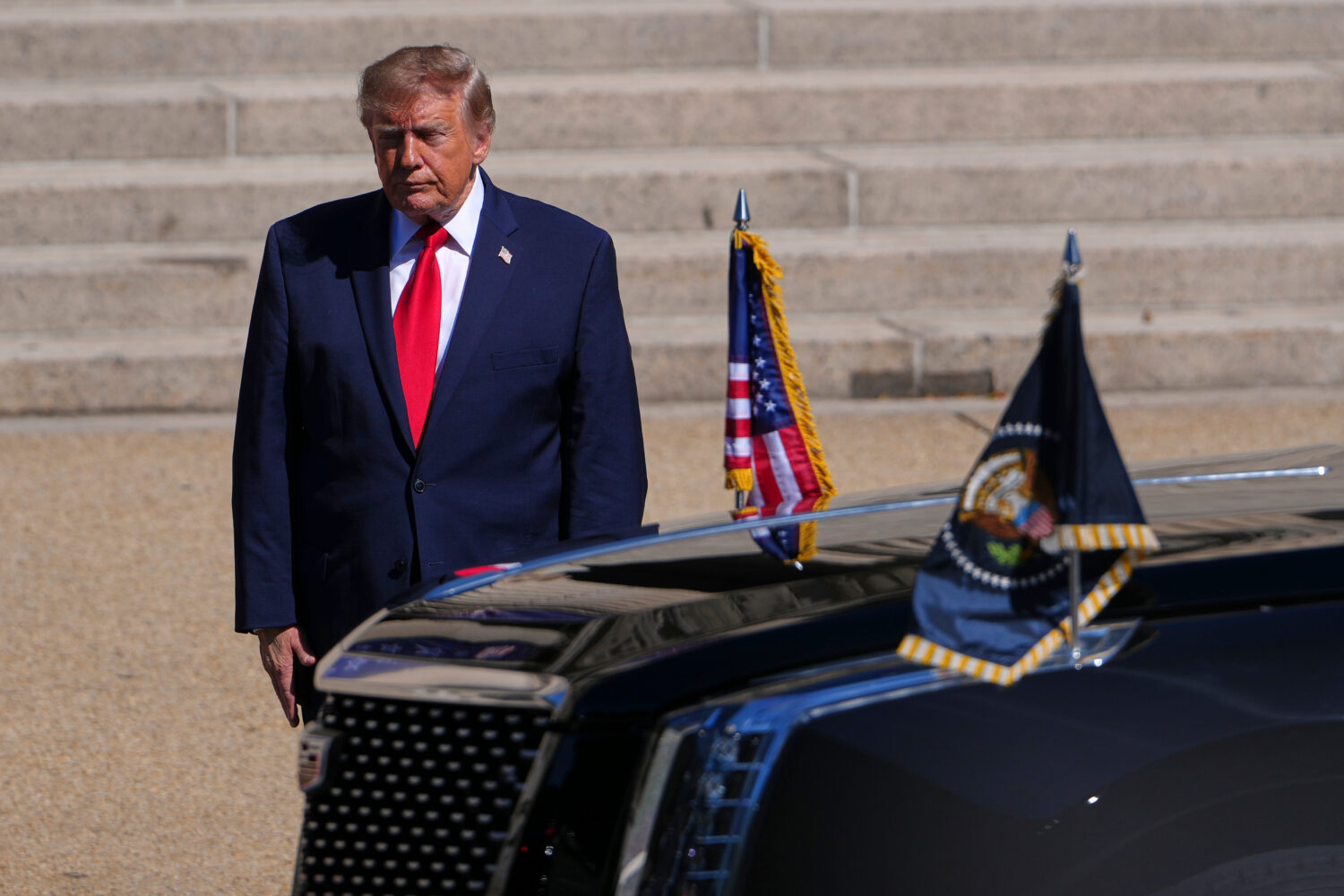 President Donald Trump arrives at the National Archives Museum to greet China's President Xi Jinpin...