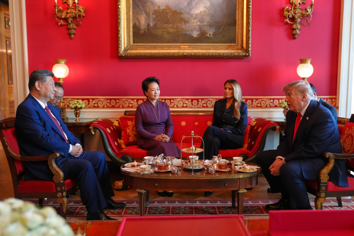 President Donald Trump, from right, and first lady Melania Trump attend a tea with China's Presiden...