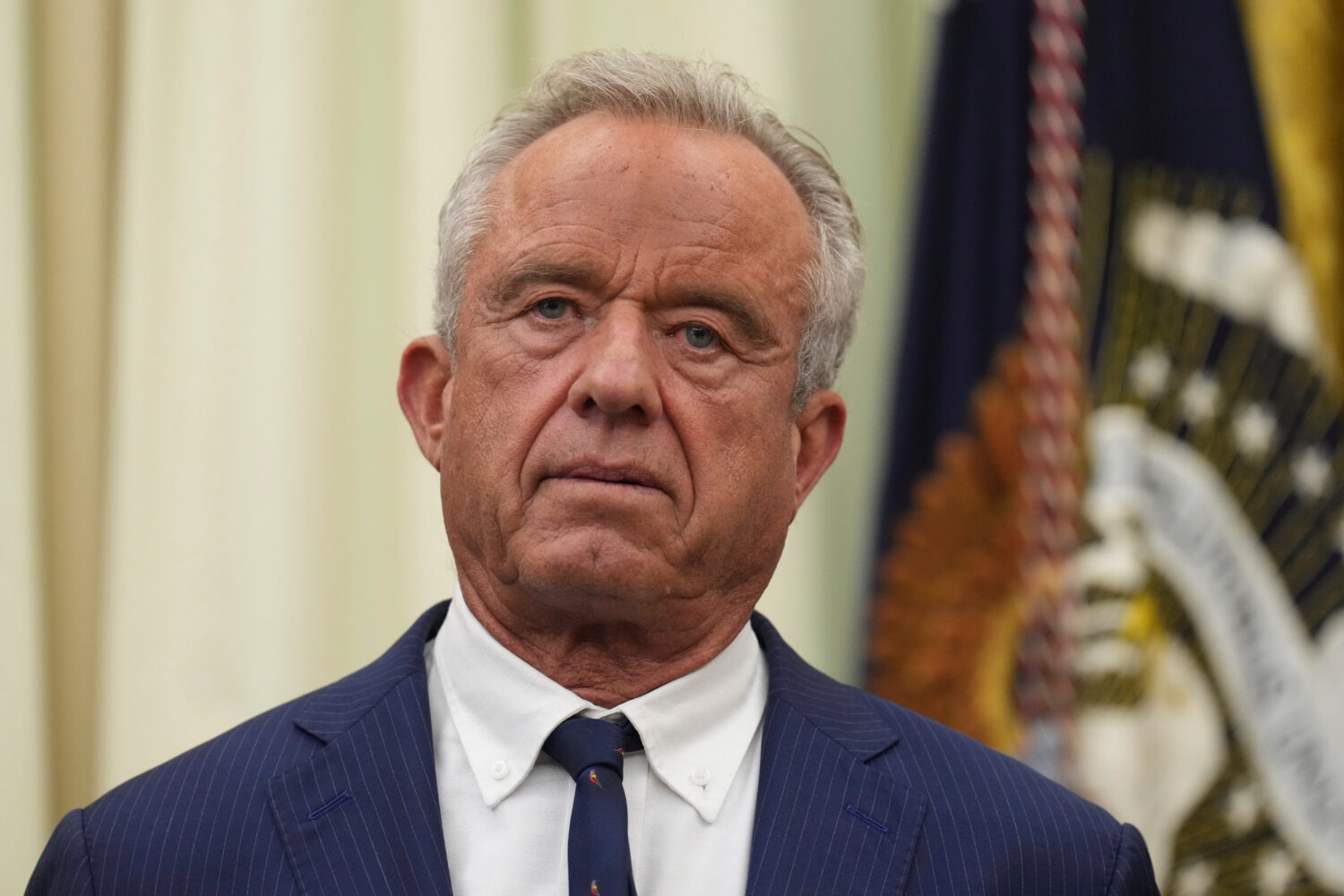 Health and Human Services Secretary Robert F. Kennedy Jr. listens as President Donald Trump speaks ...