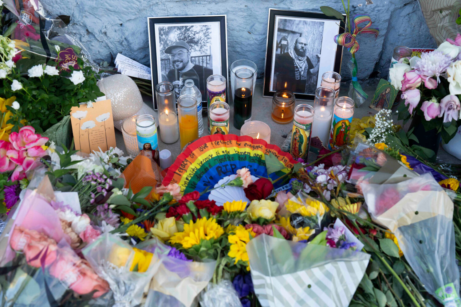 A growing memorial sits outside the Venture-N bar in Tucson, Ariz., Tuesday, Sept. 1, 2026, for Vin...