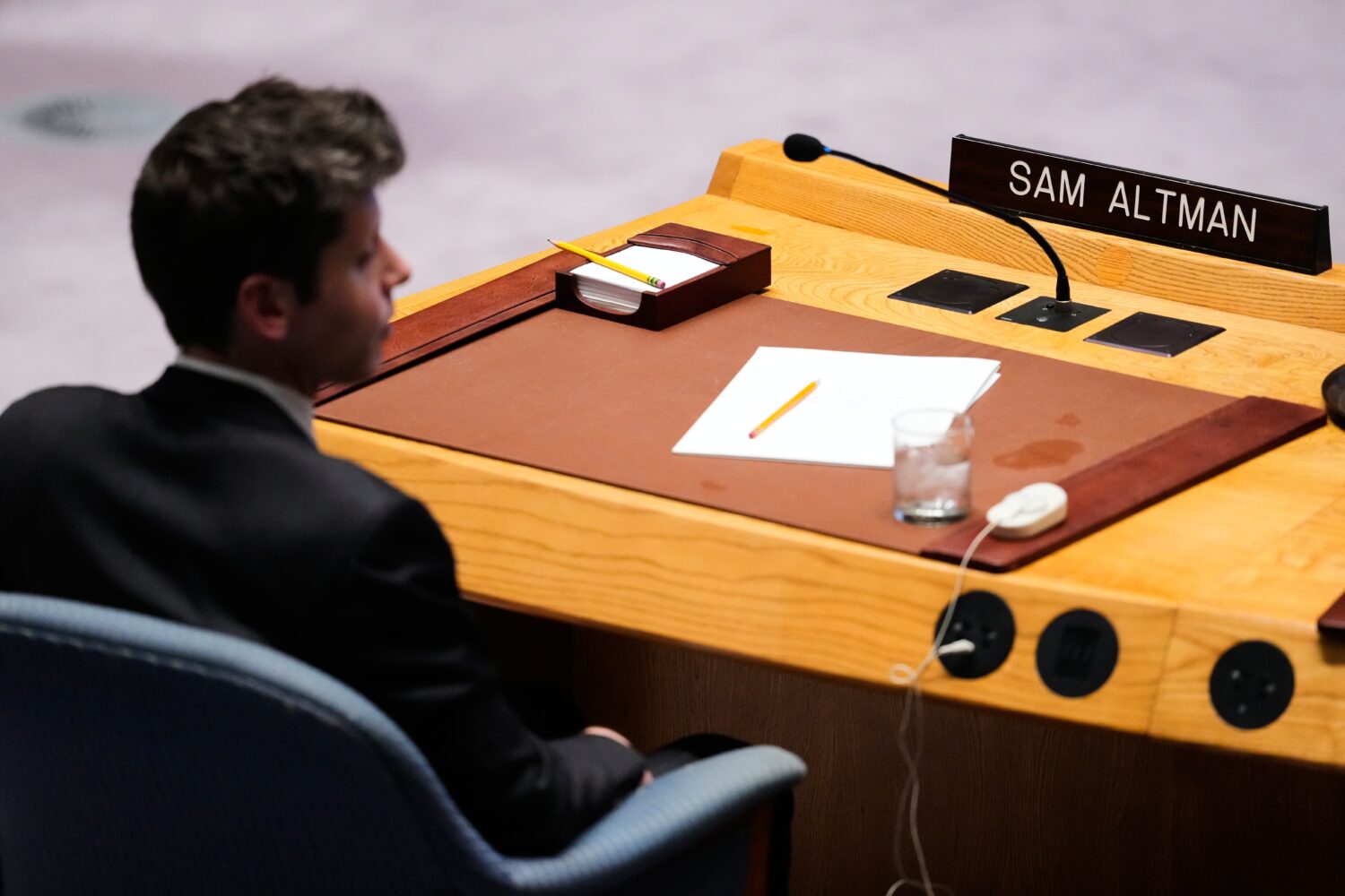 Sam Altman, CEO of OpenAI, listens during a Security Council meeting on artificial intelligence at ...