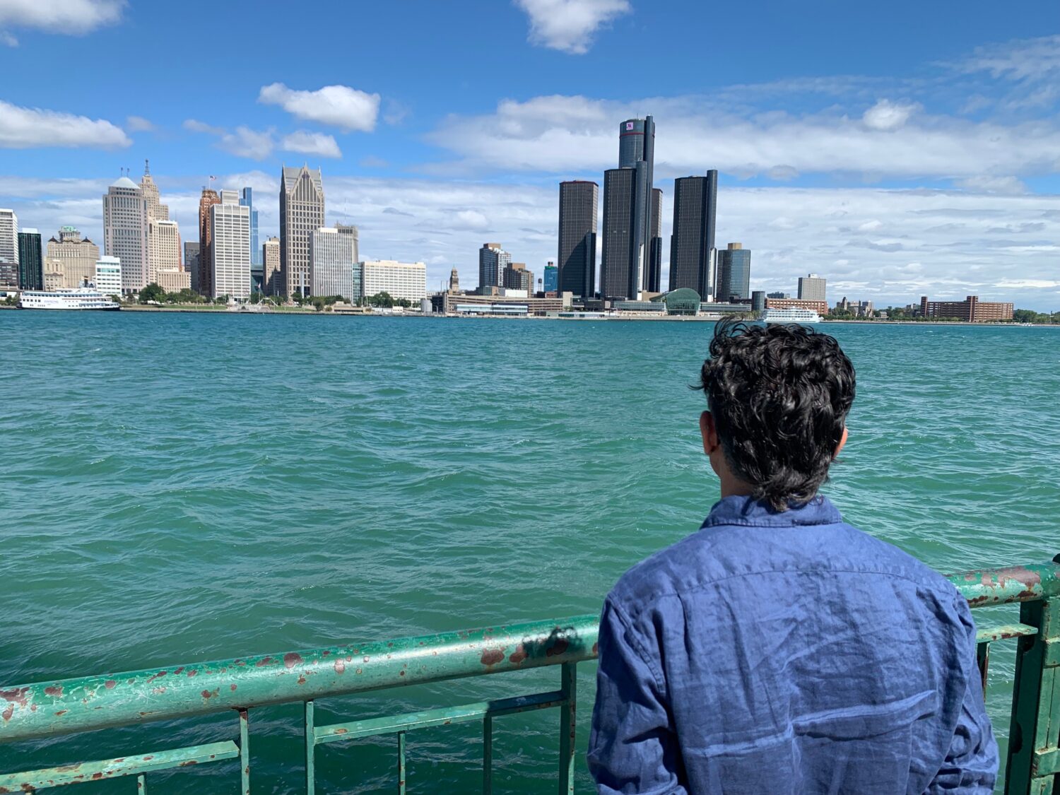 City Councillor Renaldo Agostino looks at the Detroit skyline across the Detroit River Monday, Aug....