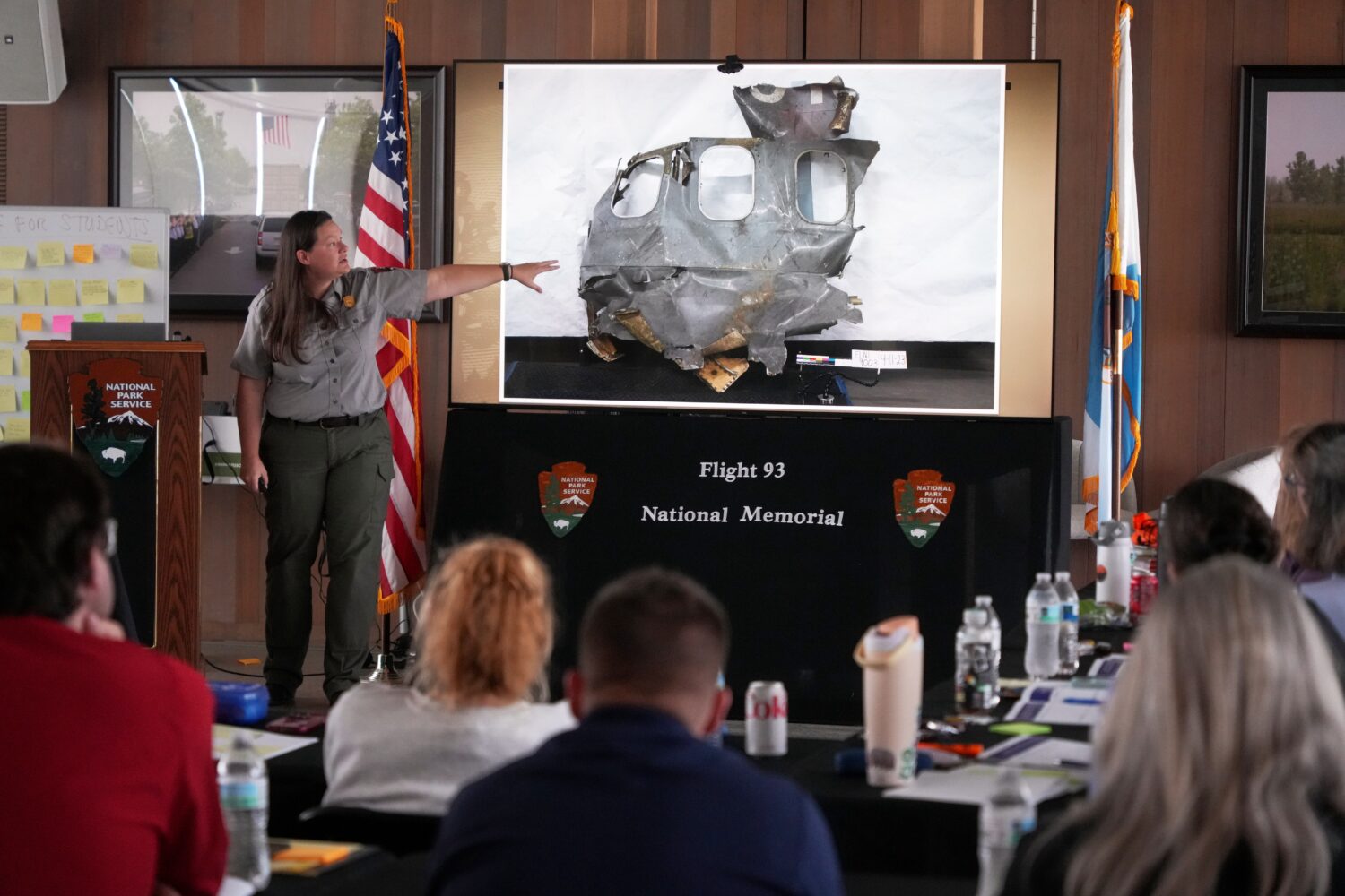 U.S. Park Ranger Betsy Keene, curator of National Parks of Western Pennsylvania, explains a slide s...