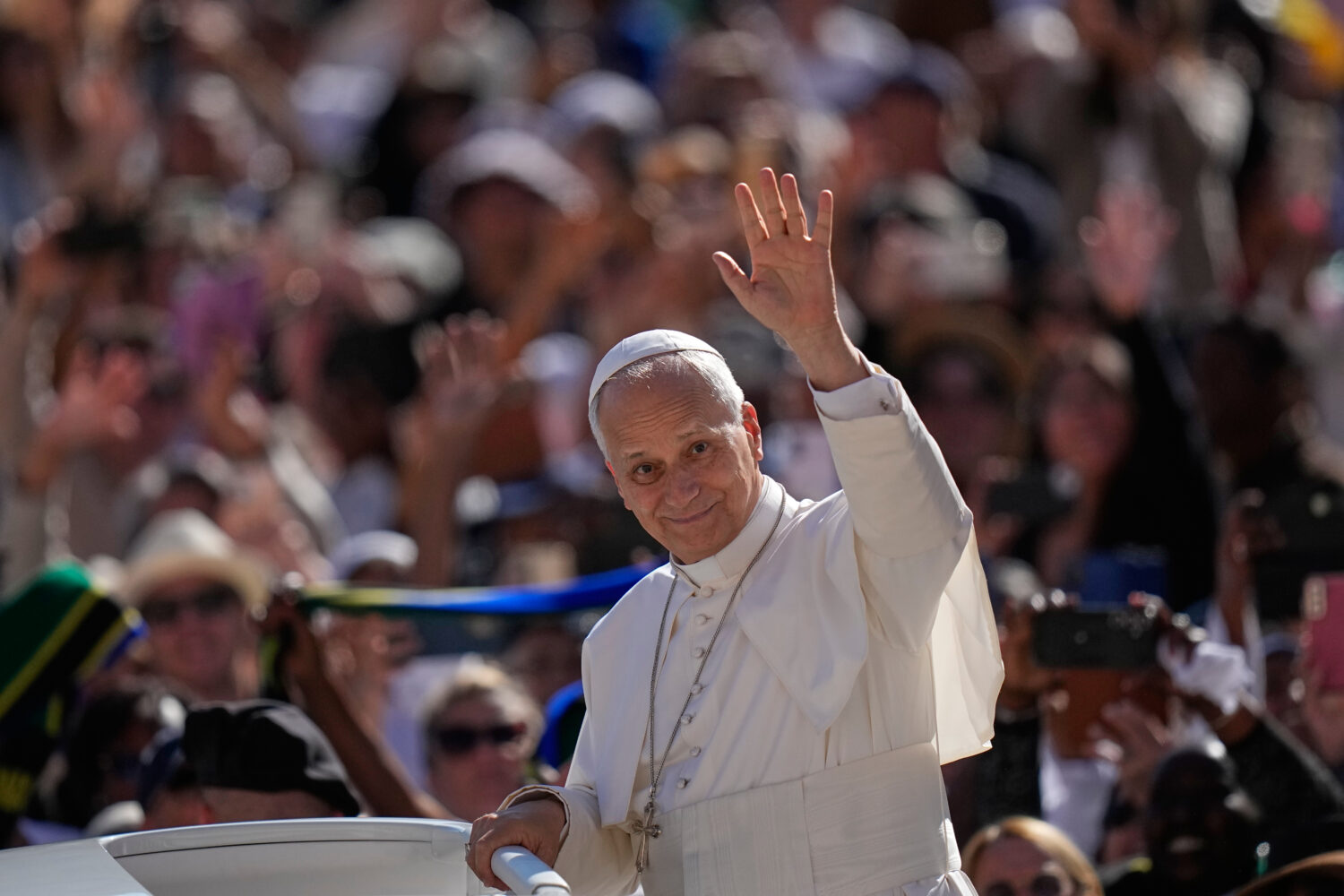 Pope Leo XIV arrives for his weekly general audience in St. Peter's Square, at the Vatican, Wednesd...