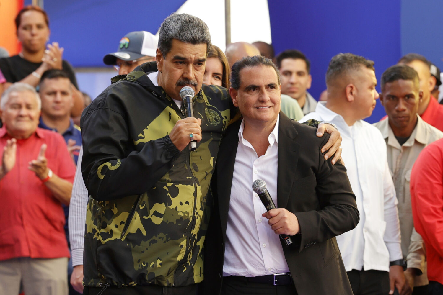 FILE - Venezuela's President Nicolas Maduro, left, and Alex Saab stand together during an event mar...