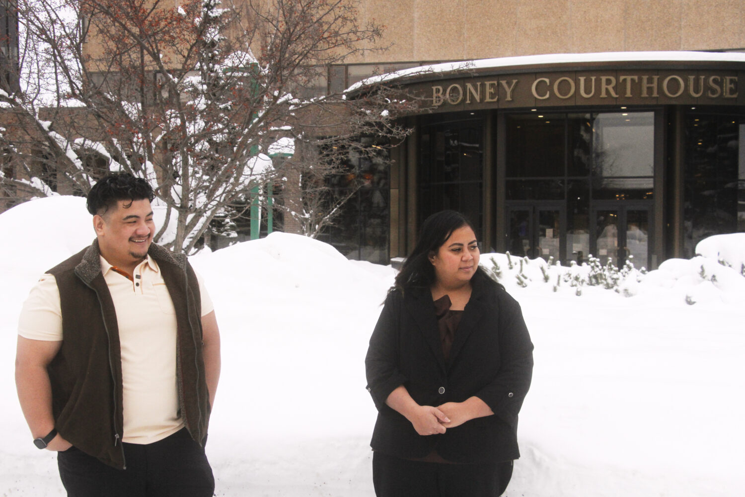 FILE - Michael Pese and his wife Tupe Smith stand outside the Boney Courthouse in Anchorage, Alaska...