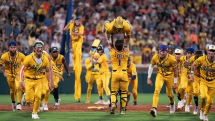 Savannah Bananas perform a routine during a game against the Party Animals at Memorial Stadium on A...