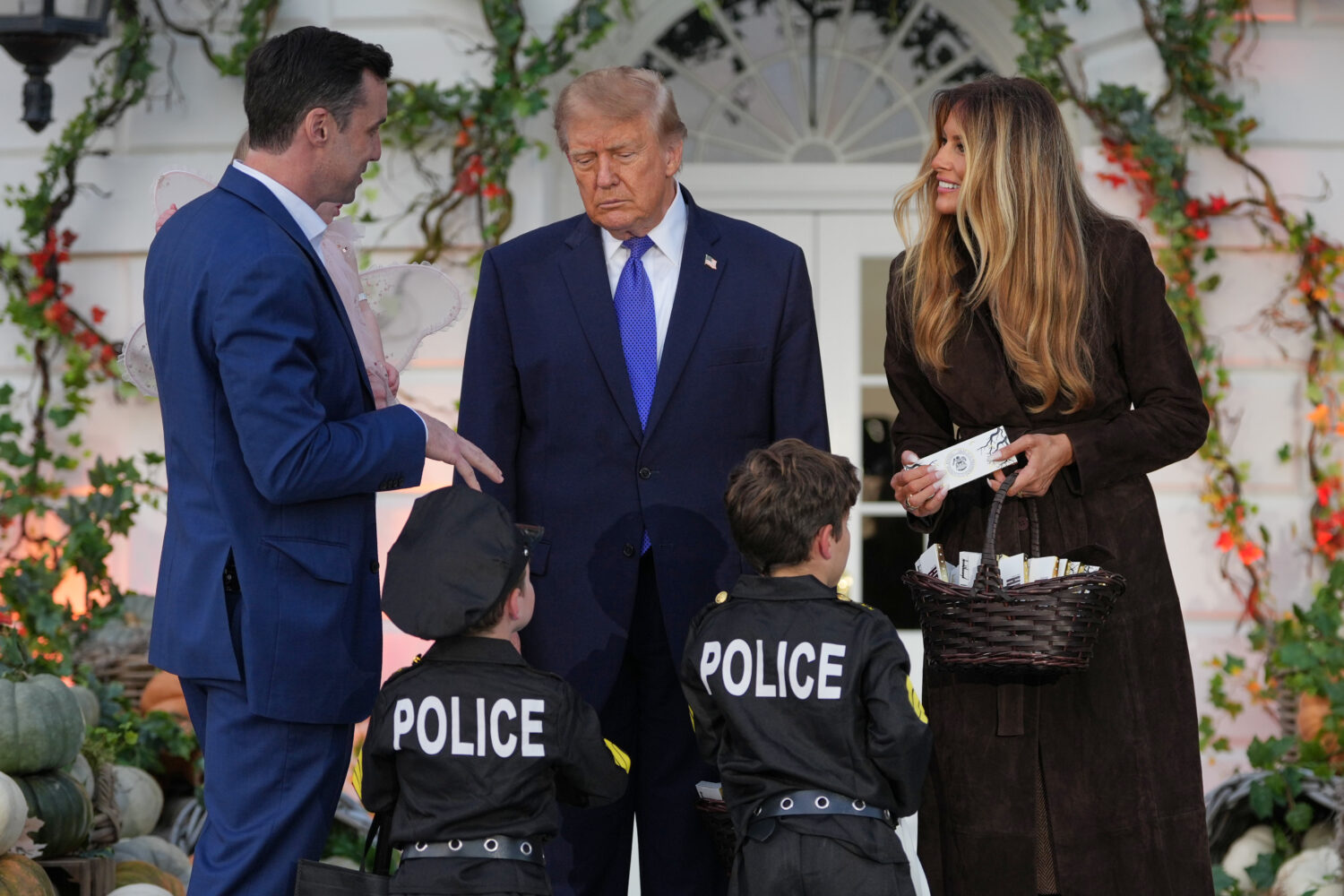 President Donald Trump and first lady Melania Trump attend a Halloween event on the South Lawn of t...