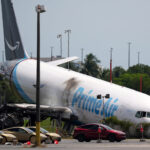 Federal report says pilots weren’t warned about wind before Amazon cargo plane crashed in Miami